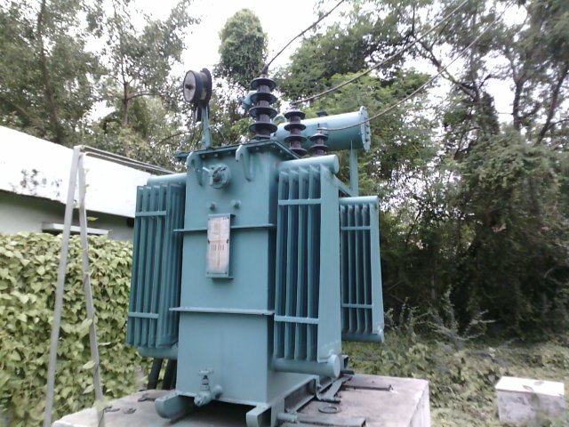 Electrical distribution transformer at site